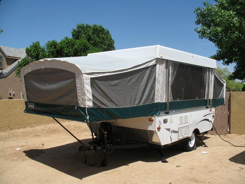 Coleman popup camping trailer deployed in suburban Arizona, 2011