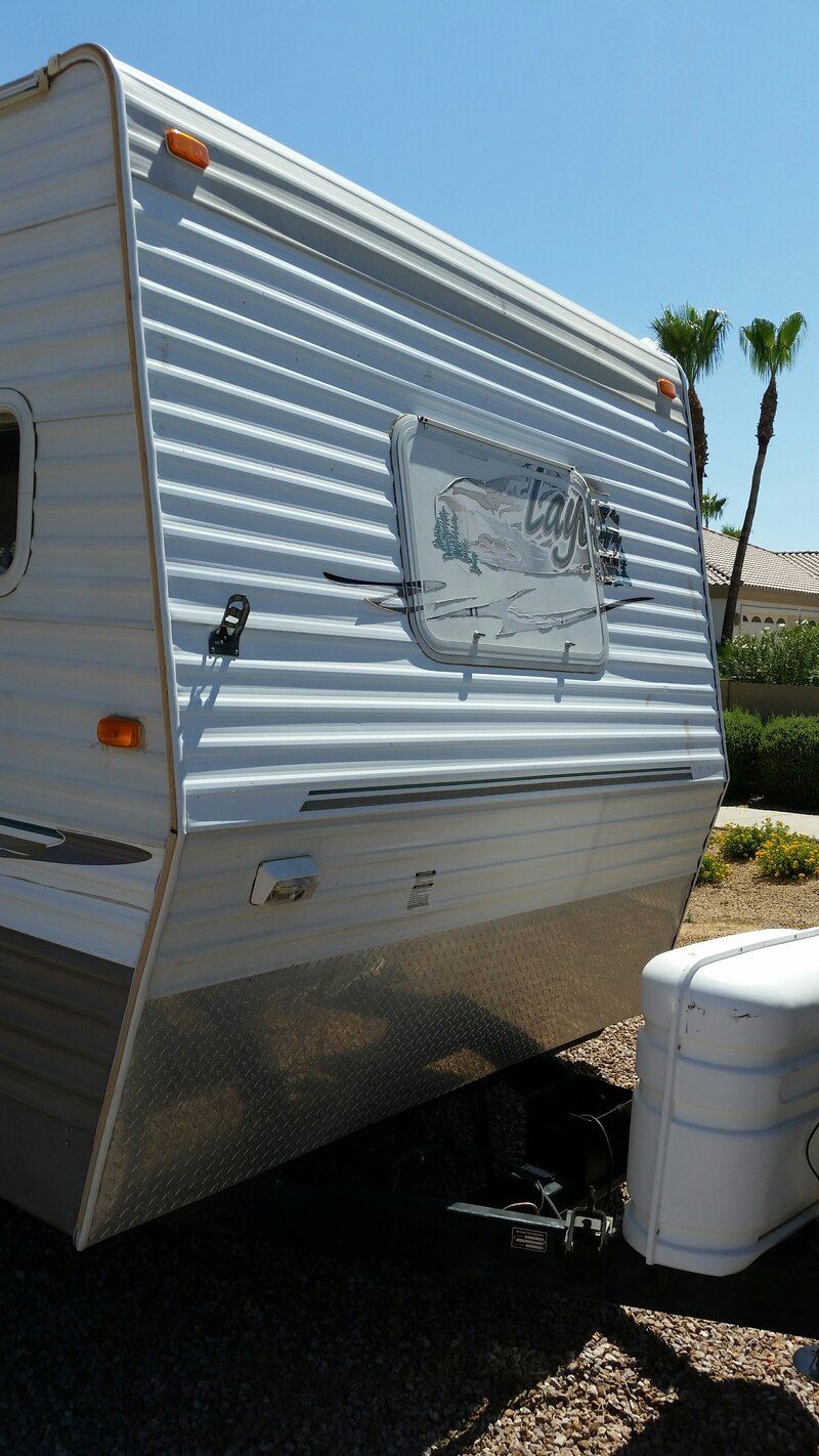 2015 Jayco travel trailer, front end with palm trees in Arizona
